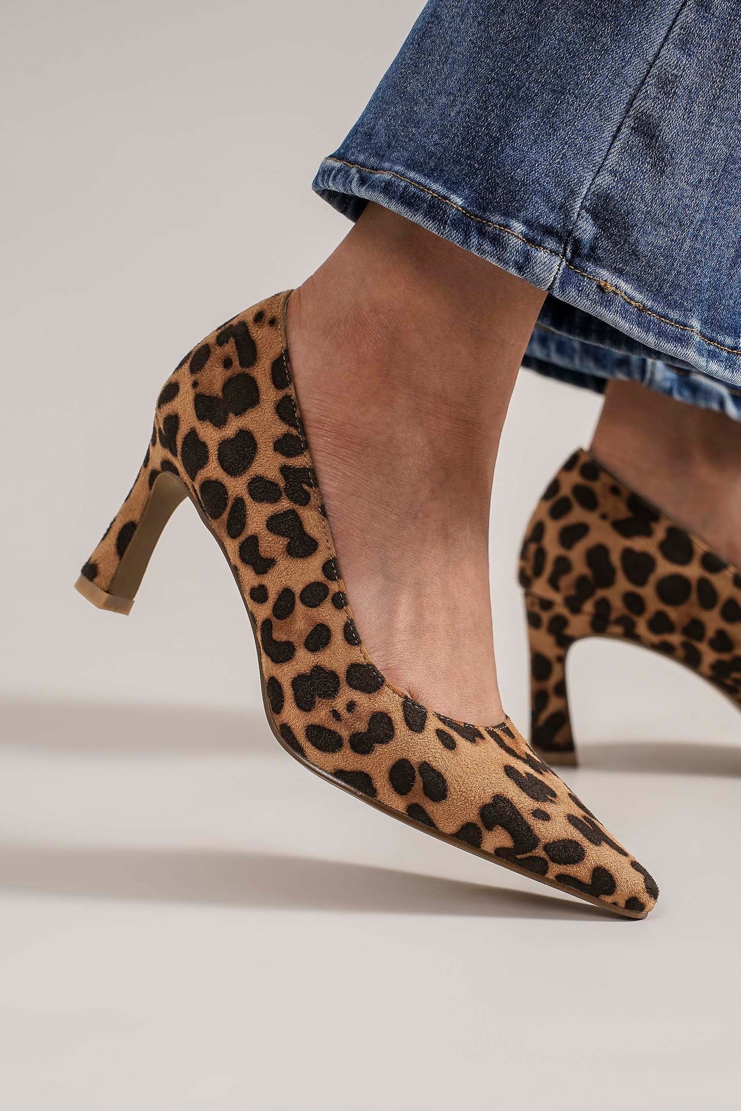 Leopard Point Toe Pumps